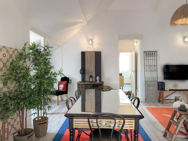Dining area with a dark wood table and Thonet bistro chairs